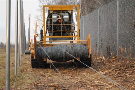 barbed wire roller for skid steer|barb wire fence winders.